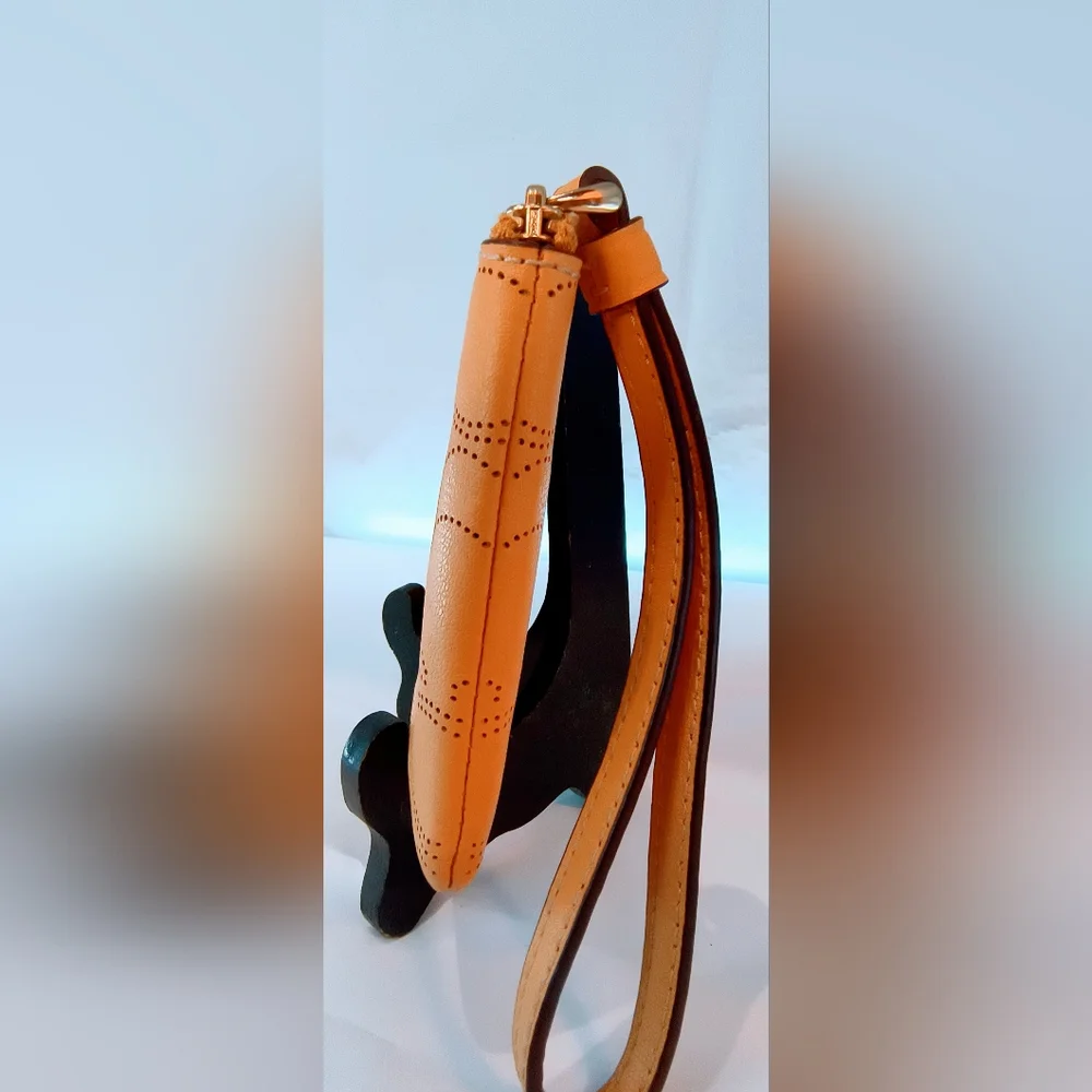 NWOT COACH Perforated Leather Corner Zip Wristlet in Honey/Tan Color